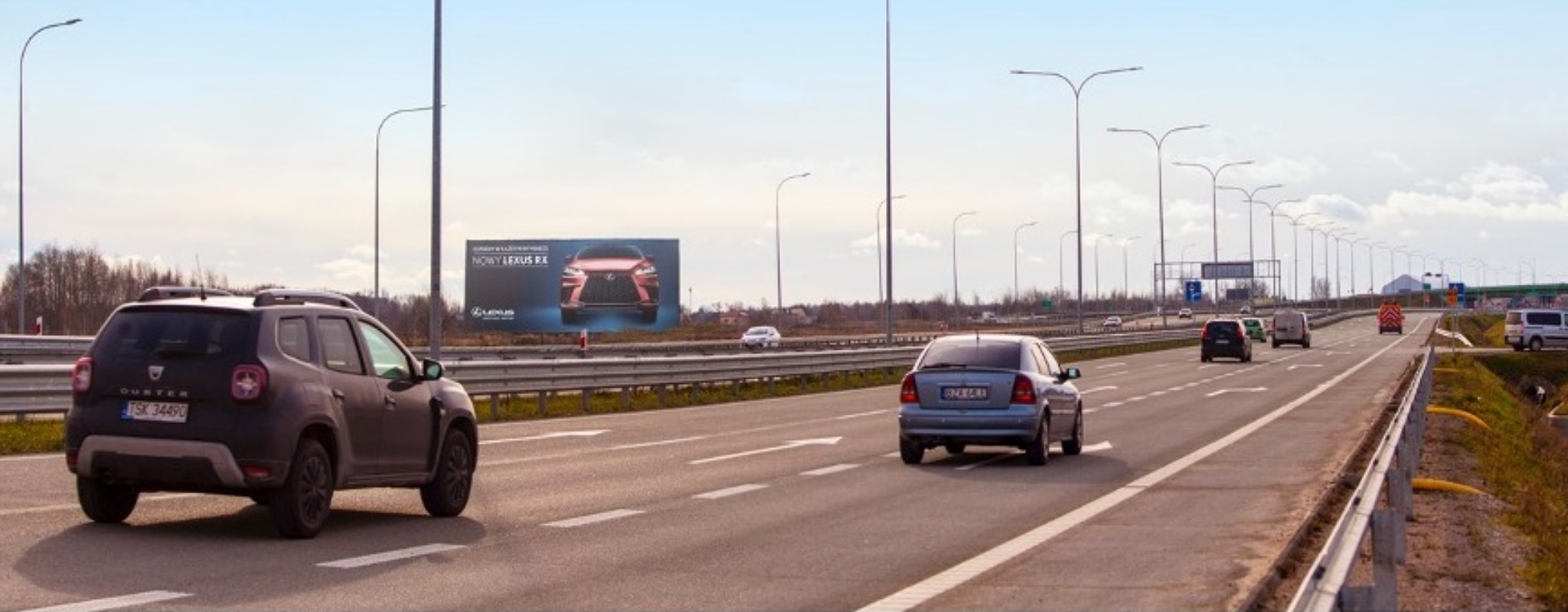 Reklama na wyjeździe z Warszawy